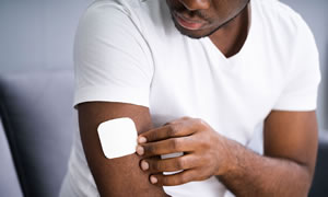 Transdermal collagen patches placed on arm