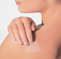 Transdermal Patch on a woman's shoulder